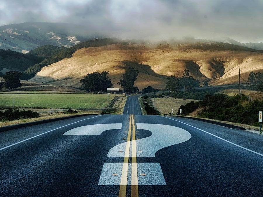 A view looking down a country road that has a question mark superimposed on it. Image by Gerd Altmann from Pixabay