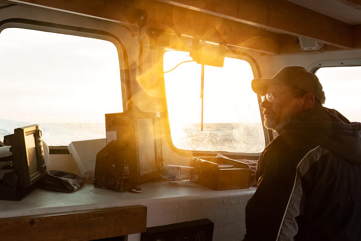 Bruce Jack sails the Andrea Lynn into the morning sun