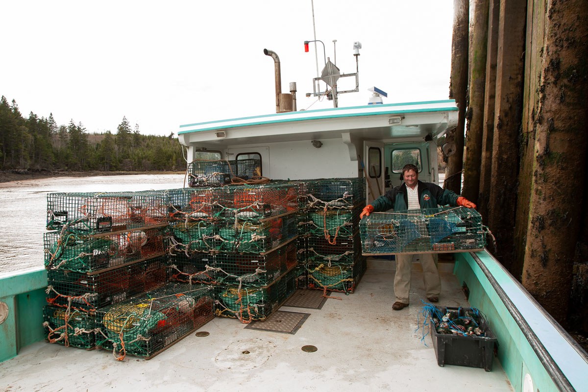 Loading supplies onto the boat at low tide
